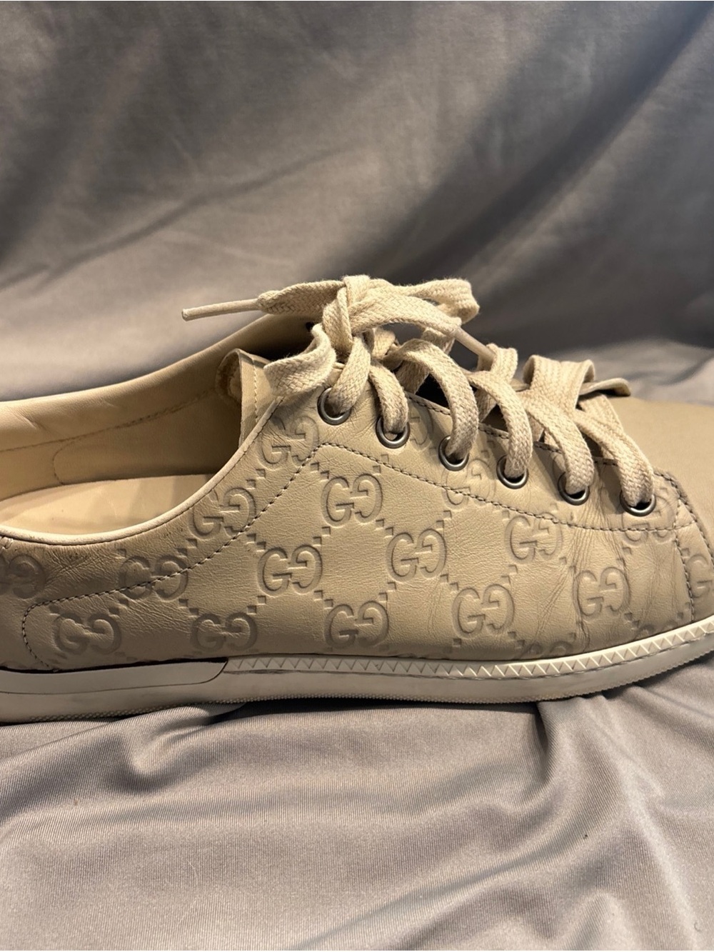 Gucci Women's Embossed GG Cream Lace-Up Sneaker